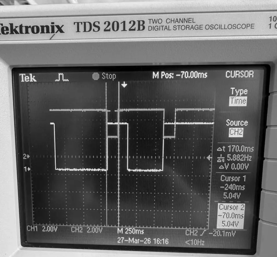 Tektronix capture of the monostable stage: cursors read Δt 170.0 ms.